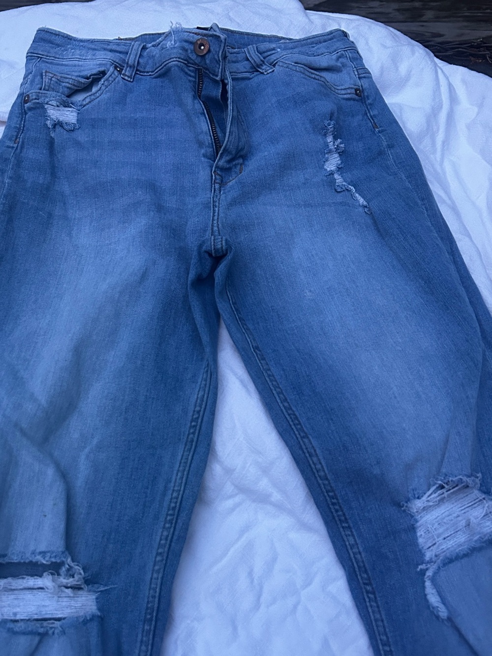 Women’s Distressed Light Blue Jeans